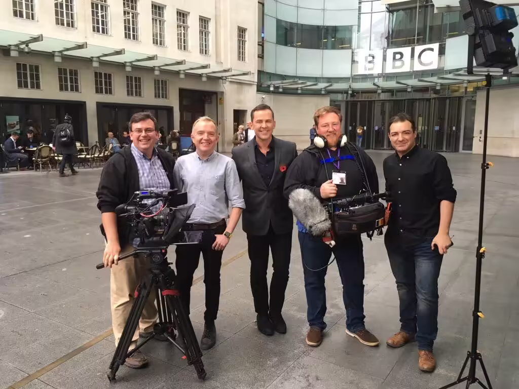 The Points of View film team with guest presenter Scott Mills outside the front of BBC New Broadcasting House