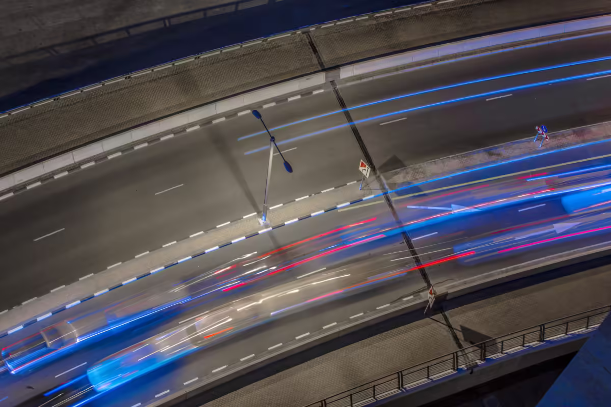 Long exposure high angled shot of cars driving past on the streets of Dubai