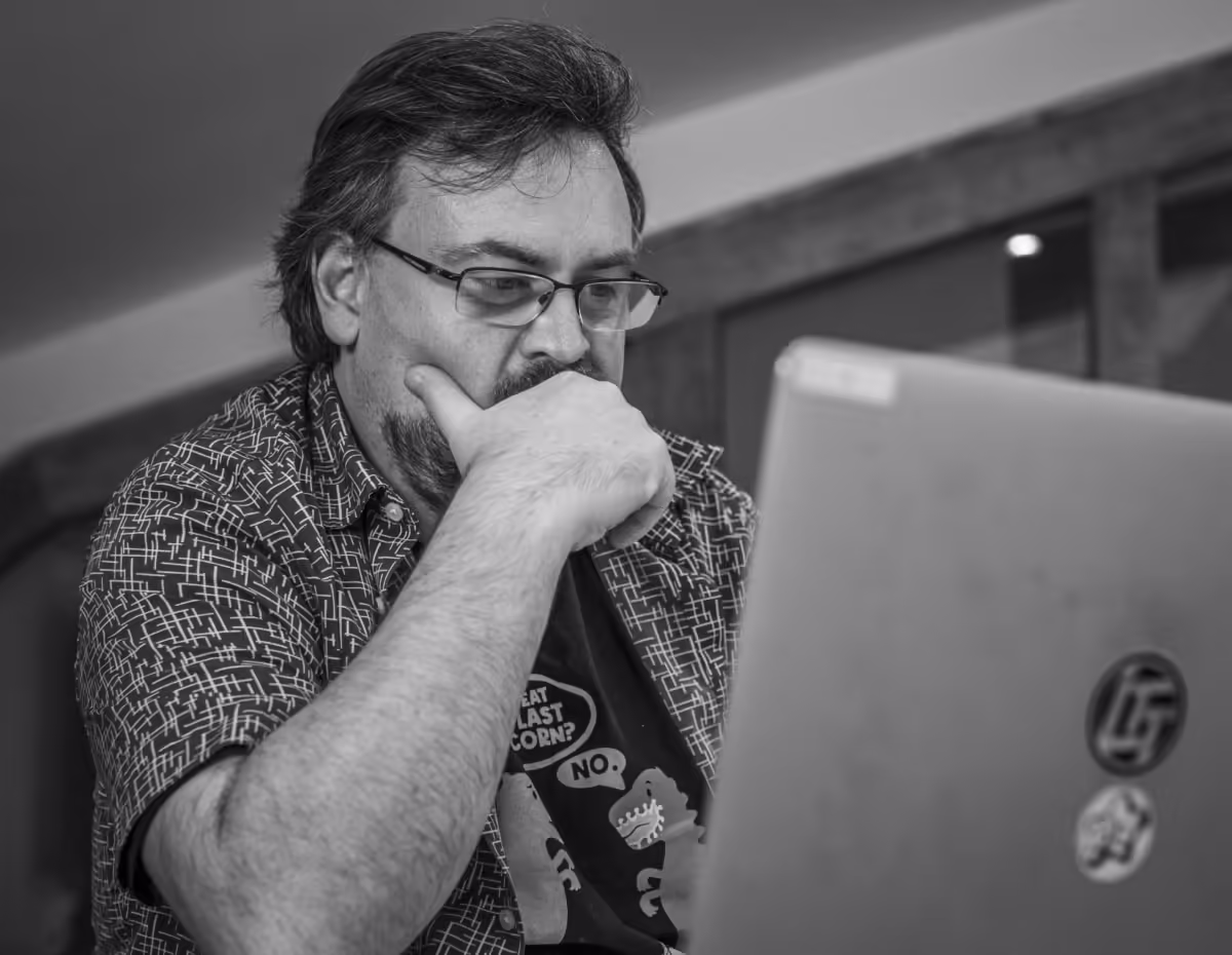 James Bailey seen here wrangling footage using a Apple Macbook pro